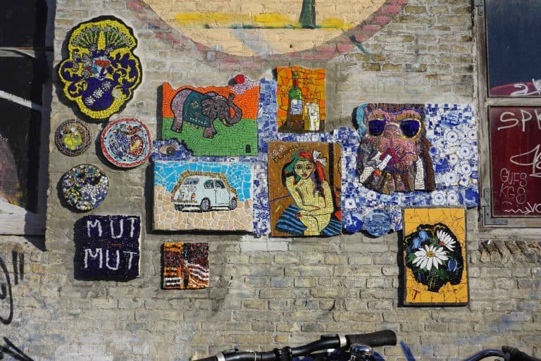 A weekend trip to Copenhagen filled with art, including a wall displaying various types.