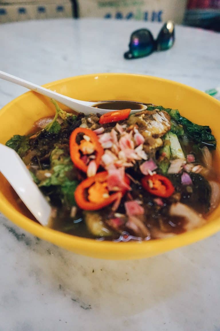A bowl of vegetables and spoon found in Penang, Malaysia.