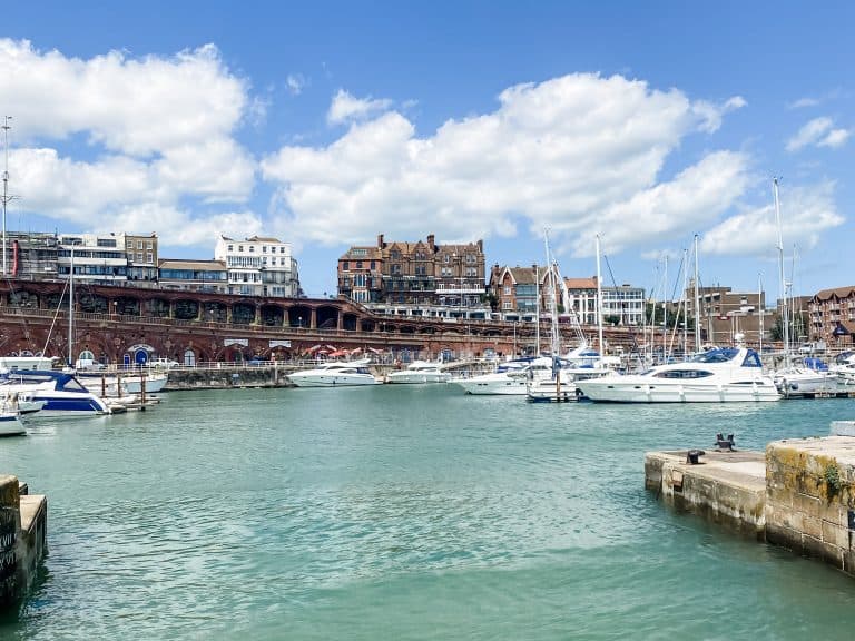 A picturesque harbor filled with boats in Kent.