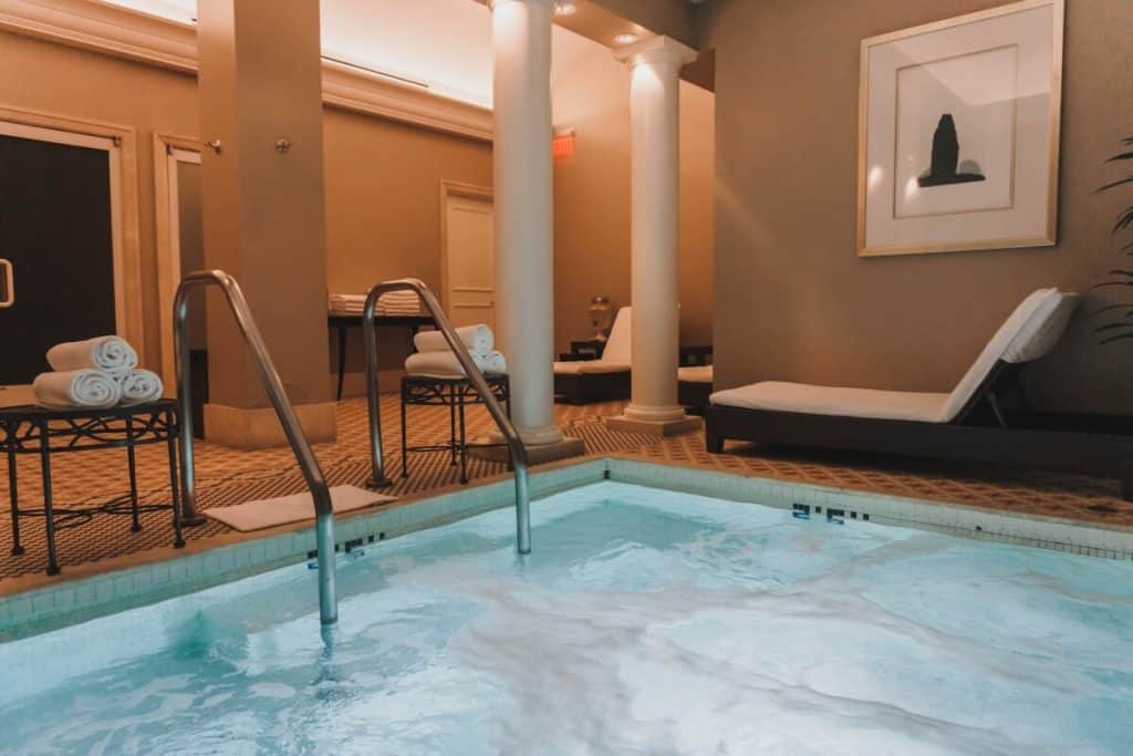 Park Hyatt Aviara offers a luxurious indoor swimming pool area with lounge chairs to guests according to this Hotel Review.